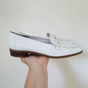 White leather loafers